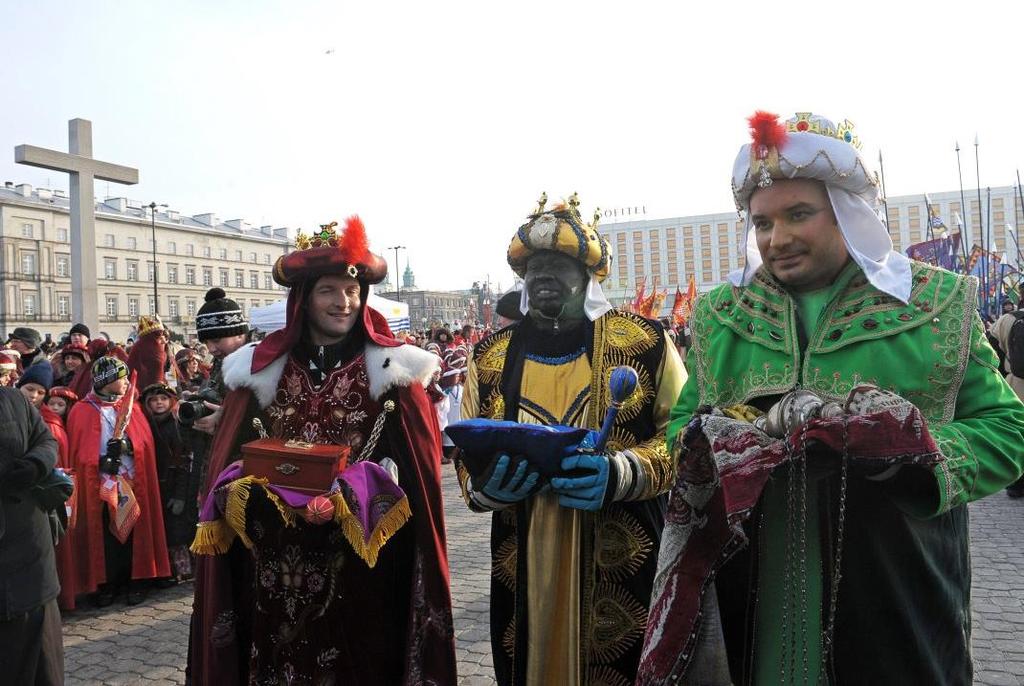 Warsaw, Poland Volunteers dressed as Three Magi bring their gifts during the