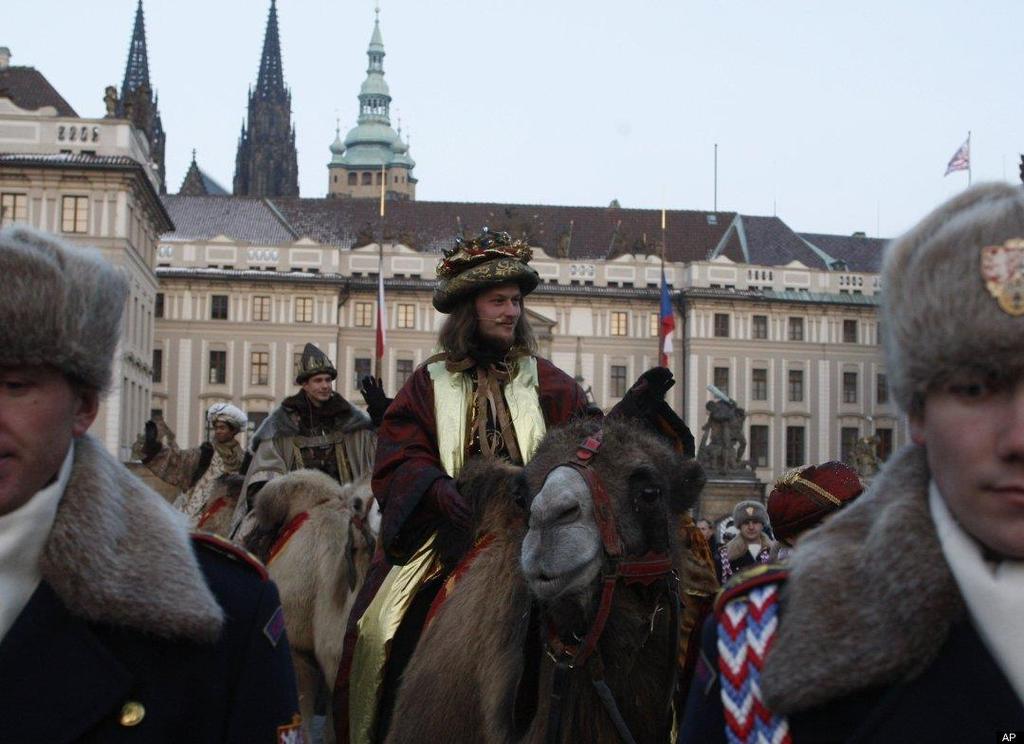 Prague, Czech Republic Men dressed as the Three Kings ride on