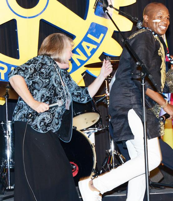 Getting Down DG Malinda Shafman of D5390, got into the act with Alex Boyé, right, in the after dinner show Thursday.