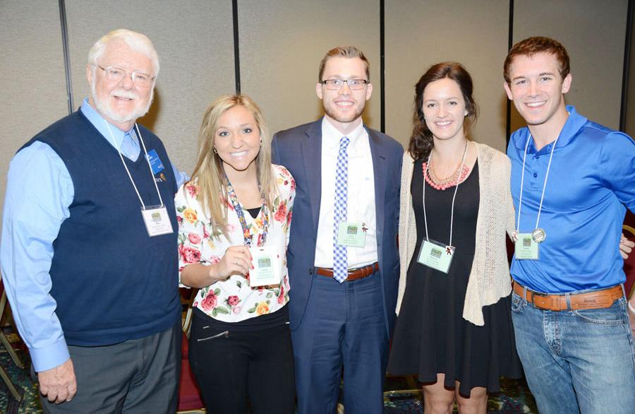 Regional Rotary Public Image Coordinator Mike Forney, left, coordinated a discussion group with these four Rotaractors, left to right, Jayme Pickett of St.