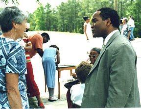 Jane Pyle, Chatham County Historical Association, talks with Jonathan Martin, executive assistant to the chancellor, Winston-Salem State University, following the dedication ceremony on 11 June 2005.