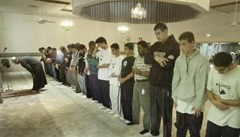 Men are joined by some of the students from the Noor-ul-Iman School for afternoon prayer at the Islamic Society of New Jersey, a mosque in suburban South Brunswick, N.J., Tuesday, May 13, 2003.