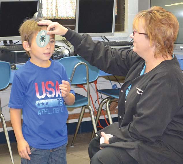 ! for more information call (580)351-8234 or (580)351-8475 we start taking consignments Friday at 9 a.m. Pick up of items available Jakob Roby gets an eye exam during the Mason s eye screening.
