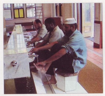 The Muslim at Prayer Page 8... but before entering the mosque, they make ablution, washing their faces, hands and feet... "O you believe!