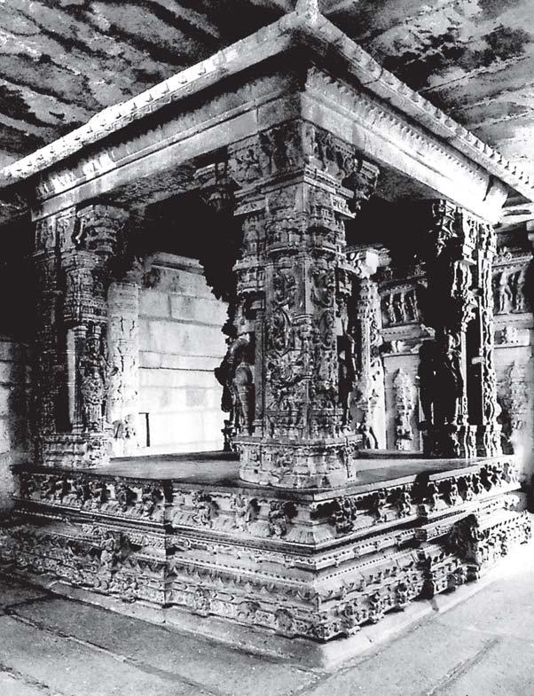 Other distinctive features include mandapas or pavilions and long, pillared corridors that often ran around the shrines within the temple complex.