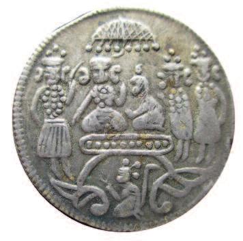 (Image courtesy of The Absolute Indian Store) Figure 17 Silver token showing a mosque with the Arabic words Madinat Sharif (Noble City) below.