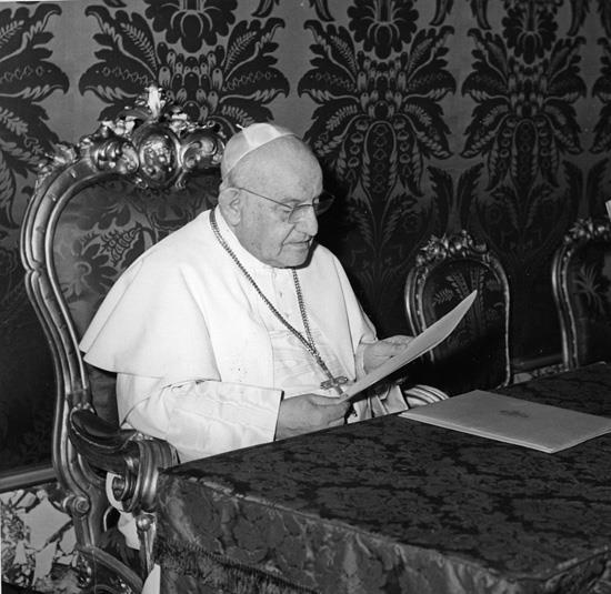 Signing One of His Encyclicals Two of his most significant encyclicals