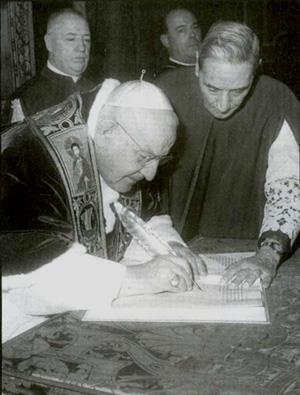 John XXIII signs Humanae Salutis,