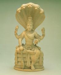 122 EXPLORING WORLD RELIGIONS Figure 4.4 This ivory statuette depicts the Hindu god Vishnu, the preserver of the universe.