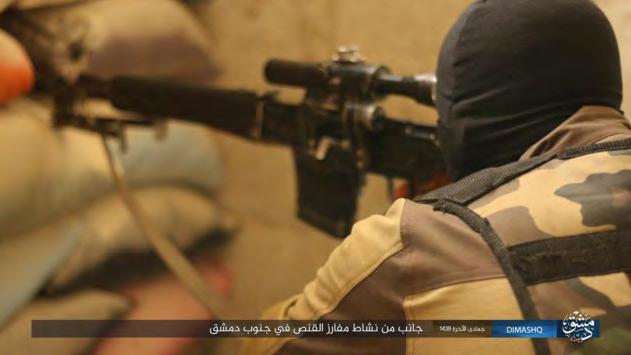 6 Right: ISIS sniper aiming at a target.