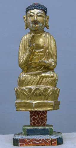 91 Deposits included an elegant goldsheathed wooden statue of the