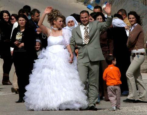 This dark Syrian man is marrying this light Syrian women.