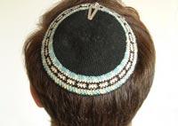 A kippah (or yarmulke) is a round skullcap worn by most