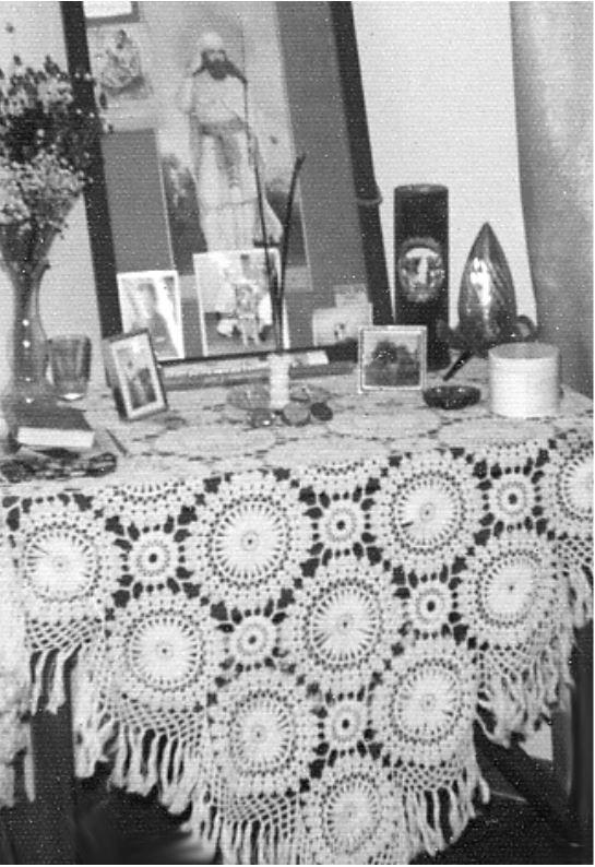 The prayer vigil may be held near the body (about three paces away) or at home by his bedside, or by a prayer corner set aside at home, specially for remembering departed loved ones [see photo left],