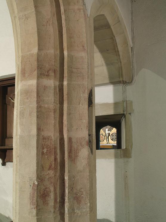 The south transept also contains this brass wall memorial to the Malorye family dated 1579.