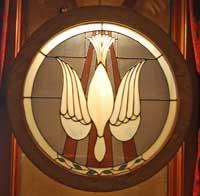 The two pieces of Helen Sanlon s art work the Word and the Spirit and the Bread and the Wine draw the eye to the West Window. It is by W.F. Clokey and was installed in memory of Mr.