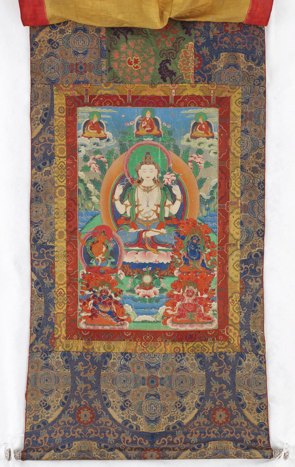 Shadakshari Avalokiteshvara, from a four-part set of thangkas Central Tibet, Lhasa, late 19th century Mineral pigments on sized cotton; Chinese Qing brocade
