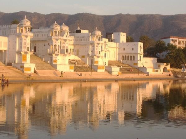 DESTINATION Pushkar Location: It is located 135 kilometers of the state capital, Jaipur, 385 kilometers from Delhi. Pushkar is a sacred town for the Hindus, situated 11 kms.