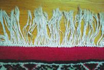 GLOSSARY Fringe Warps extending from the ends of a rug to prevent the