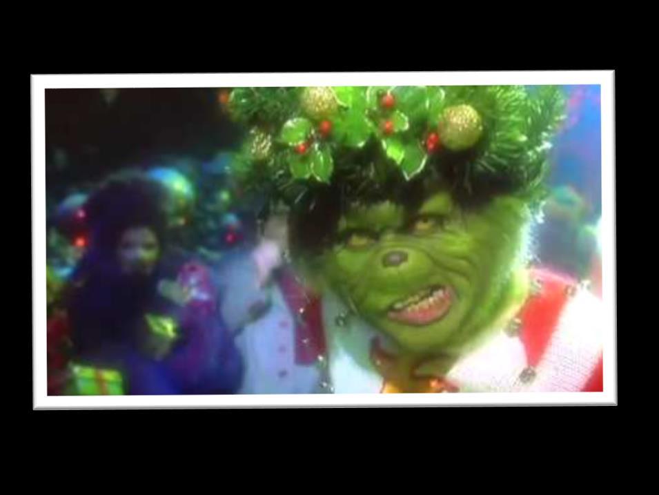 Can you guess which of these two photos is our very own Jim Moser singing about the Grinch, and