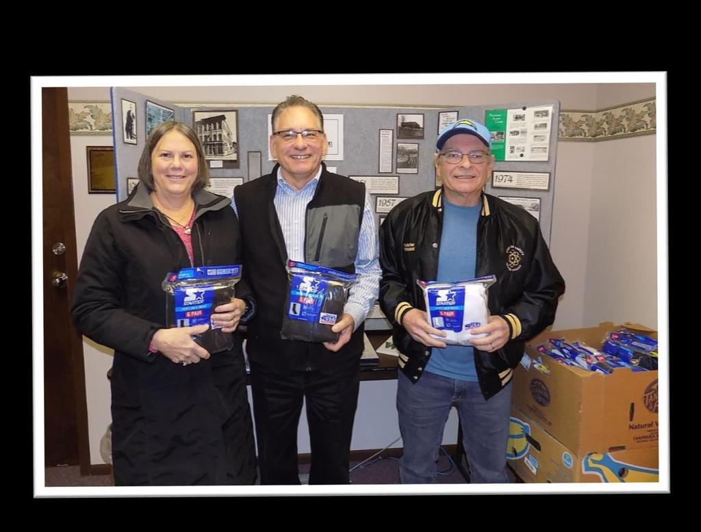 Can you guess how many pairs of socks Charlie Deer (l) and Don Ridgley (r) delivered to the City