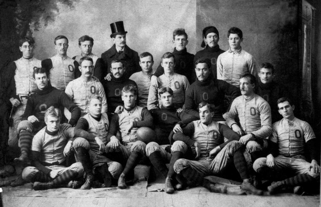 to raise a voice in praise 17 John Henry Wise (second row, second from right, in dark sweater) and the undefeated 1892 Oberlin College football squad that included player/coach John Heisman (second