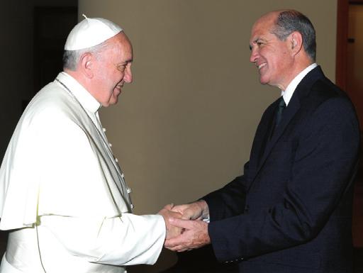 Who is Cross Catholic Outreach? L Osservatore Romano Pope Francis greets Cross Catholic Outreach President Jim Cavnar.