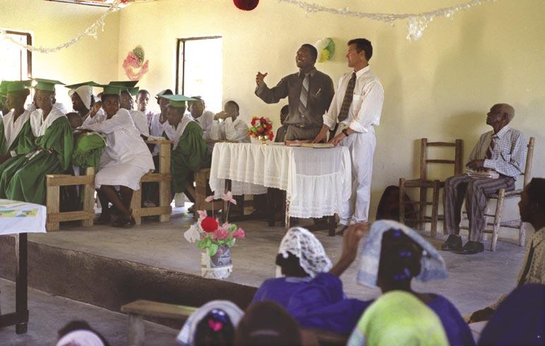 Men and boys at the church in La Boc lead the service in worship. Holding the clinics in each community makes it easier for the very sick to come, said Pastor Brian.