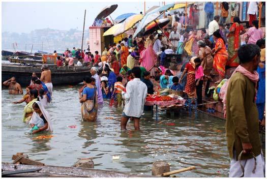 on the Ganges River where Hindus perform morning rituals Slide 37