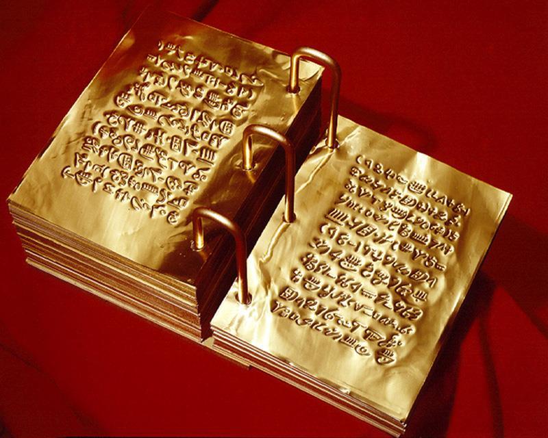 A reconstruction of the Golden Plates Joseph claimed to have found. Whatever the truth of his claim, we can be fairly certain they were not made of gold as gold is too soft to carve on in such a way.