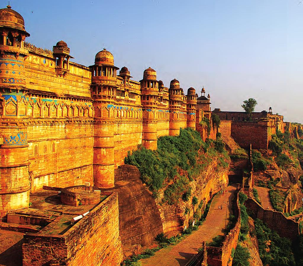 INDIA FORT CITY GWALIOR Gwalior Fort made of sandstone. The outer walls, two miles in length and 35 feet high, still stand as a witness to its reputation as an invincible structure.