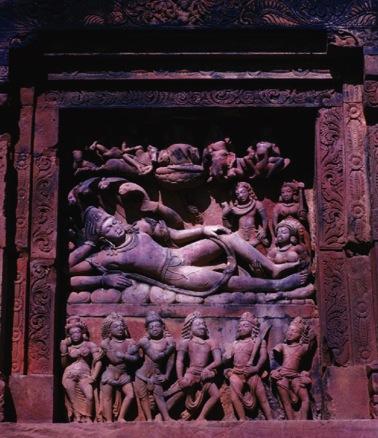 As narayana dreams, a lotus arises from his navel, bearing Brahma