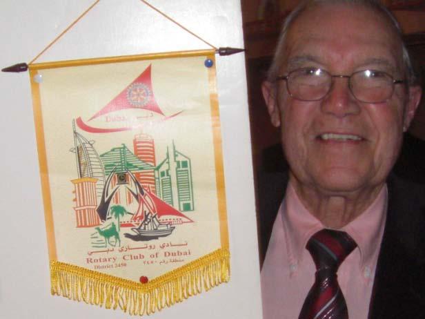 Presentations Club banner. Carter LeBeau presented a club banner from the meeting he attended at the Rotary Club of Dubai.