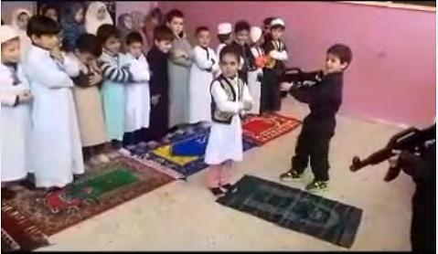.." Pictures from the performance (Facebook page of al-huda al-islami kindergarten, December 19, 2017) The muezzin calls