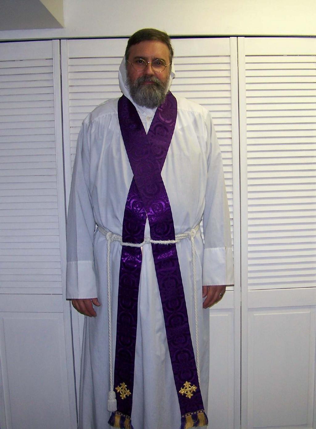 This completes e basic underwear, worn by priests, deacons and subdeacons, and now we move on to e more elaborate vestments. The stole is put on next.
