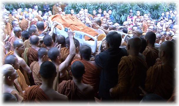 His body was placed in the center of the sãlã with his head facing towards the Buddha statue.