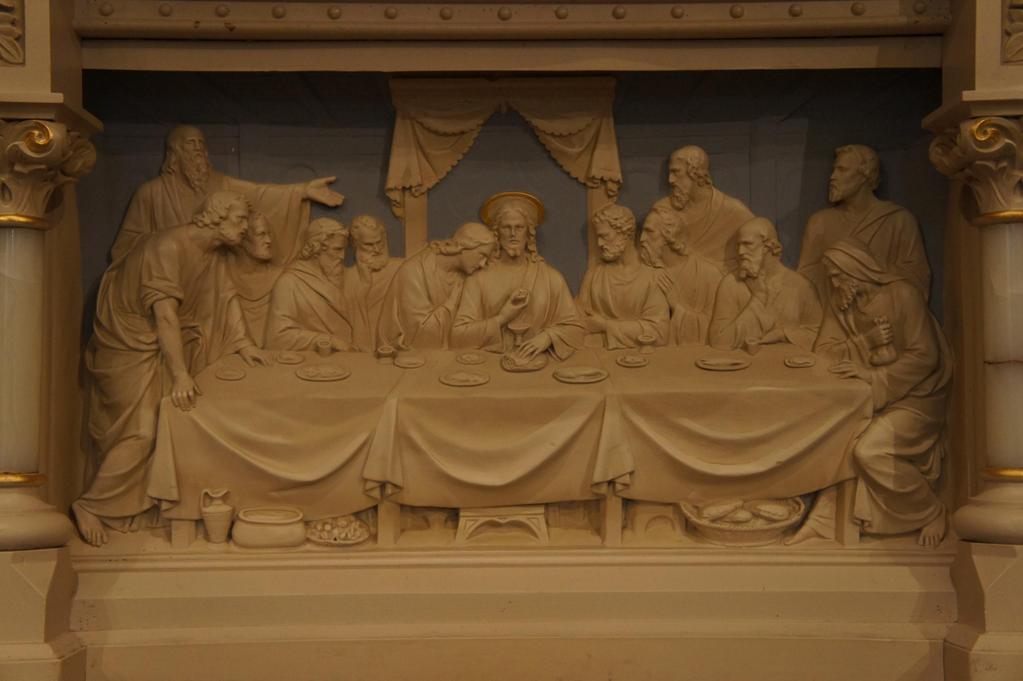 15 Below the tabernacle there is a bas relief of Christ and the twelve apostles at the Last Supper.
