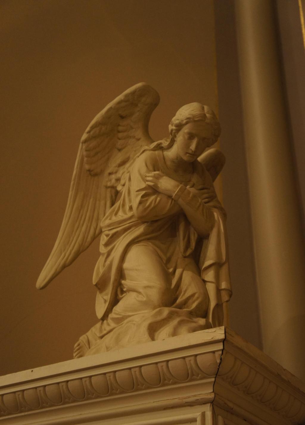 Two angels were originally part of the St. Michael s altar before 1958, but were removed.