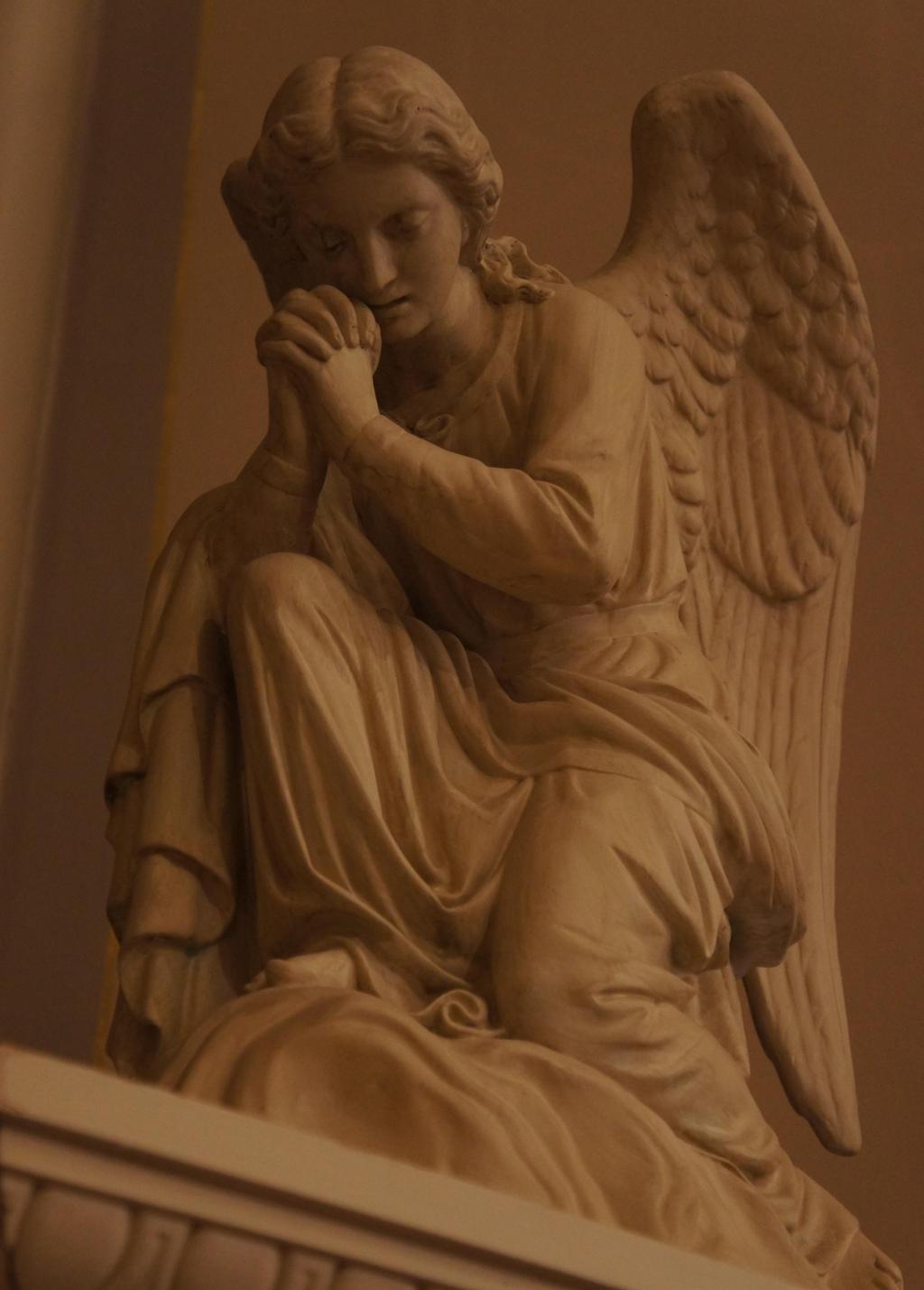 The two angels, which remind us to be respectful in the presence of the
