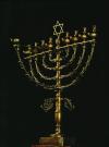222 EXPLORING WORLD RELIGIONS Figure 6.4 A Hanukkah menorah. The events of the Maccabean revolt are celebrated each year in the festival of Hanukkah (see page 234).
