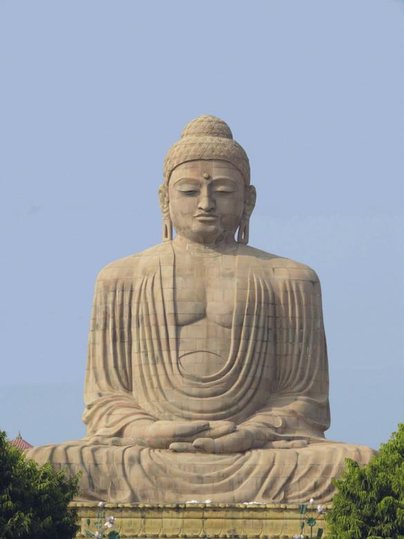 6 A3 Worship and Festivals Look at the photograph. It shows a statue of the Buddha at Bodh Gaya. A3 (a) What happened at Bodh Gaya?