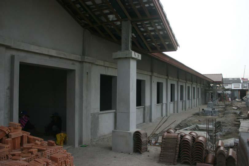 roof joist. The roof tiles awaiting installation can be seen in photographs 3b and 4.