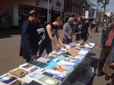 holding Tabligh Stalls in their