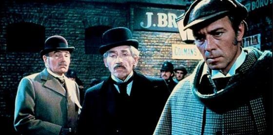 That night, Watson meets up with Holmes, along with two other men a Scotland Yard detective named Peter Jones and a bank manager named Mr. Merryweather.