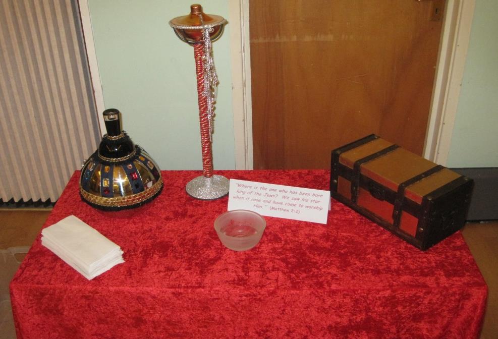 14 Station 12: Wise men visit Jesus Items Needed: Table covered in red velvety material.