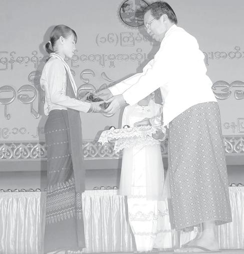 Winners awarded in 16 th Myanmar Traditional (from page 6) Division, third; Maung Kyi Tha Bo of Mandalay Division, first in the basic education level (aged 15-20) boys contest, Maung Aung Ko Ko of