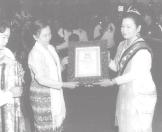 NLM Prime Minister Lt-Gen Soe Win presents certificate of Thiri Thudhamma Manijotadhara title to U Zaw Min Zin.