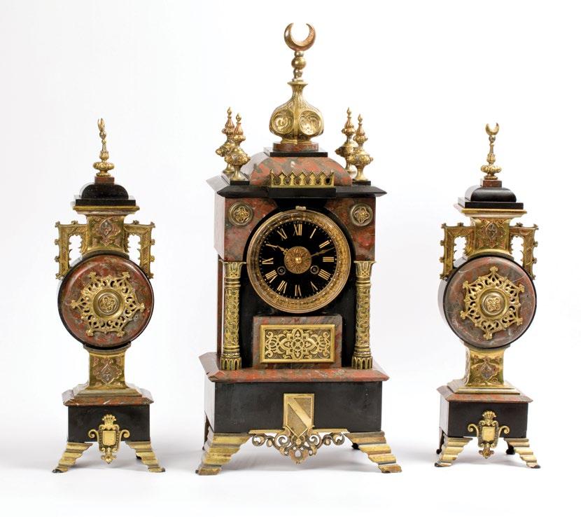 79. An Orientalist Bronze and Marble Three-piece Clock Set (Garniture) طقم مكون من ثالث ساعات مصنوعة من البرونز والرخام ومزخرفة على الطراز الشرقي Comprising a mantel