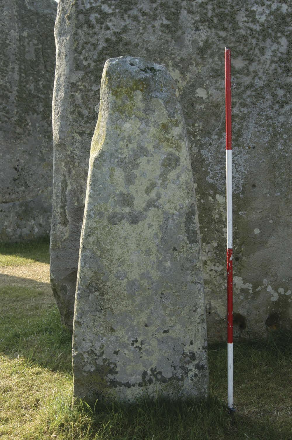 TIME & MIND 113 Figure 11. Stonehenge, Wiltshire. Stone 70 in the Bluestone Oval. Shaped like an axehead blade-down in the ground, or a human head and torso? Scale totals 2m.
