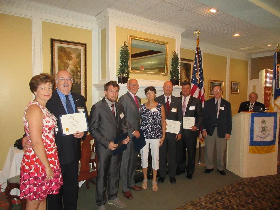 Chapter Happenings Cont d On the left: The Williamsburg chapter welcomes new members at the July luncheon.